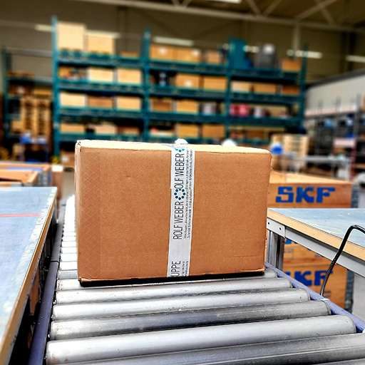 Paket ROLF WEBER GRUPPE auf Rollband