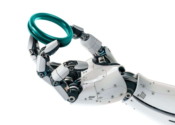 Roboterhand mit CNC Dichtung in der Hand